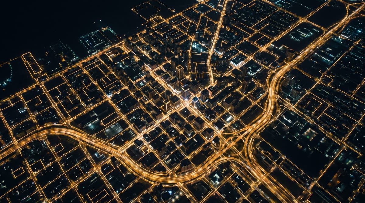 City grid lit like a system architecture diagram
