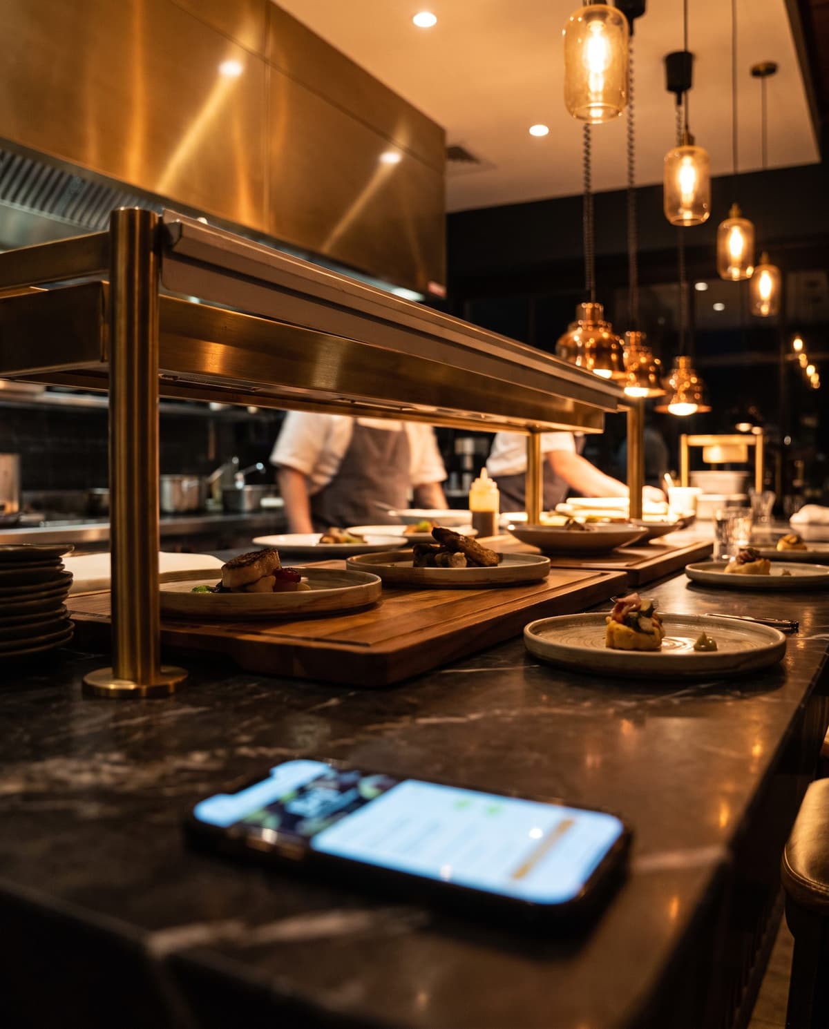 Restaurant counter with a mobile pickup order on a smartphone
